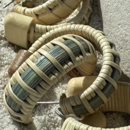 Close-up of woven sandals with a textured surface
