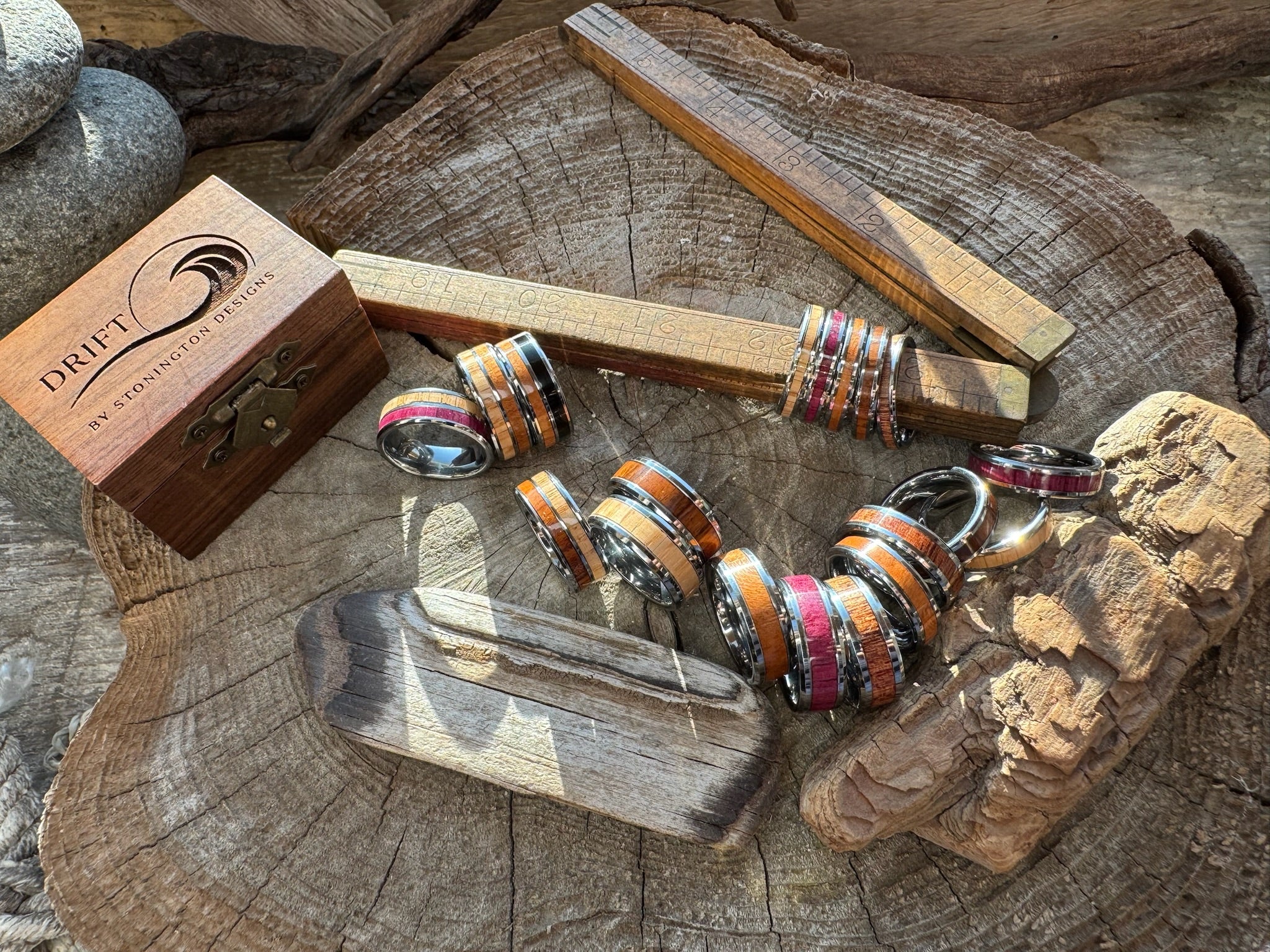 colorful bracelets on a wooden surface