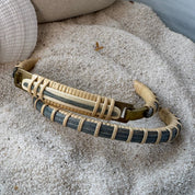 Summer Sky hand-dyed bamboo cane Surf clasp bracelet with a wave-patterned wooden clasp and natural weaver detailing — handcrafted by Military Spouse artisans in Stonington, Connecticut using American-made materials.