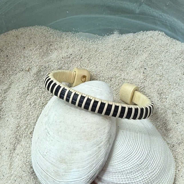 Navy hand-dyed bamboo cane Symphony cuff bracelet, a lightweight handcrafted design available with custom end-cap etching — American-made by Military Spouse artisans in Stonington, Connecticut.