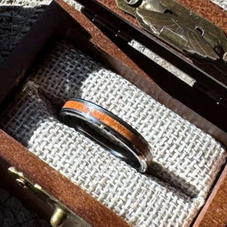 Handcrafted Whisper 4mm tungsten ring with a cherry wood inlay, displayed in a handcrafted wooden gift box.