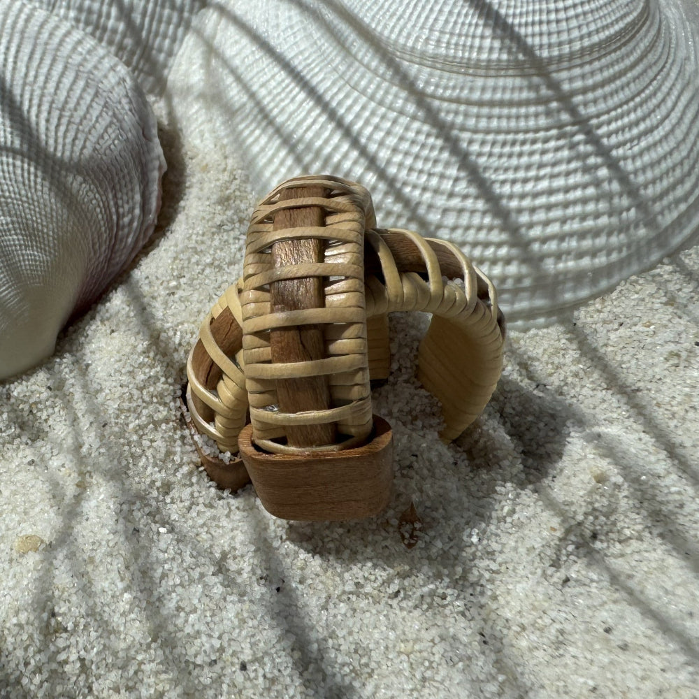 Cherry wood Seasons medium hoop earrings wrapped in natural weaver cane, a balanced handwoven design that coordinates with the Seasons bracelet collection — American-made by Military Spouse artisans in Stonington, Connecticut.