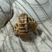 Cherry wood Seasons medium hoop earrings wrapped in natural weaver cane, a balanced handwoven design that coordinates with the Seasons bracelet collection — American-made by Military Spouse artisans in Stonington, Connecticut.