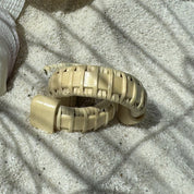 Holly wood Seasons medium hoop earrings finished with a light weaver wrap, a graceful handwoven pair built for easy everyday style — American-made by Military Spouse artisans in Stonington, Connecticut.