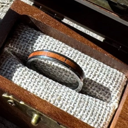 Handcrafted Whisper 4mm tungsten ring with a mahogany wood inlay, displayed in a handcrafted wooden gift box.