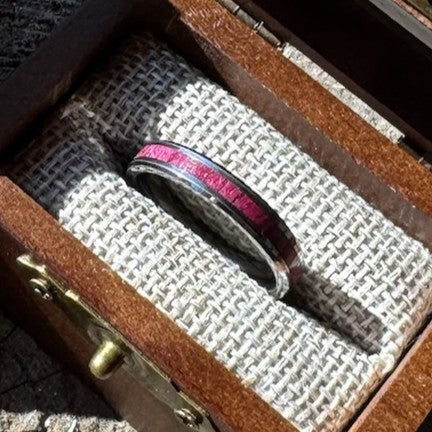 Handcrafted Whisper 4mm tungsten ring with a purple heart wood inlay, displayed in a handcrafted wooden gift box.