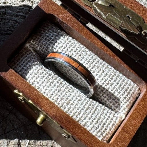 Handcrafted Whisper 4mm tungsten ring with a rosewood inlay, displayed in a handcrafted wooden gift box.