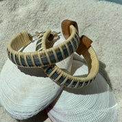 Summer Sky hand-dyed bamboo cane Seasons large hoop earrings with natural weaver detailing, designed to coordinate with the Seasons bracelet collection — American-made by Military Spouse artisans in Stonington, Connecticut.