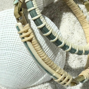 Close-up of the patterned clasp on a handcrafted Surf bracelet from the Summer Blues collection, hand-dyed in Summer Sky blue cane.