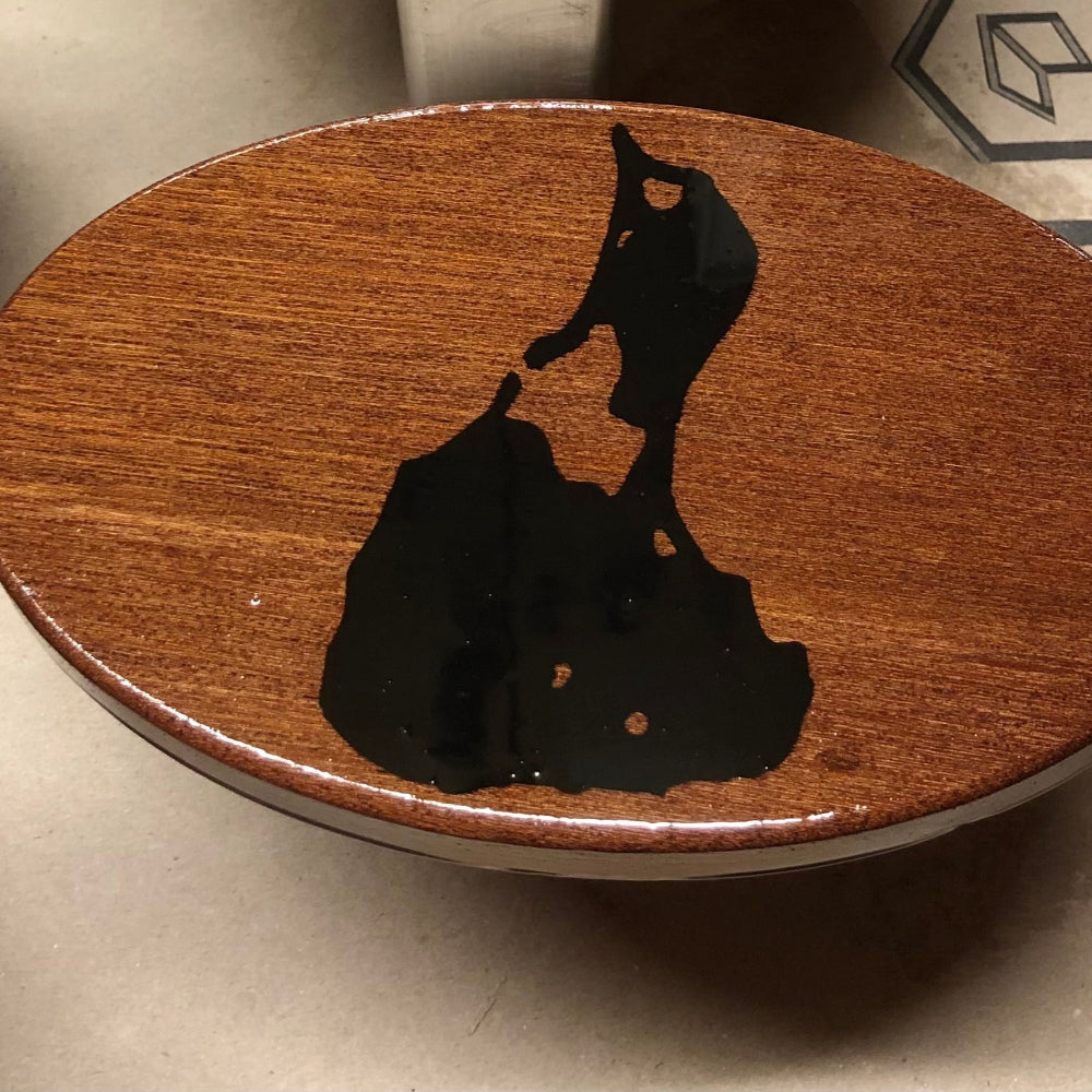 Map of Block Island in black on an inlay wooden hitch cover in the shop