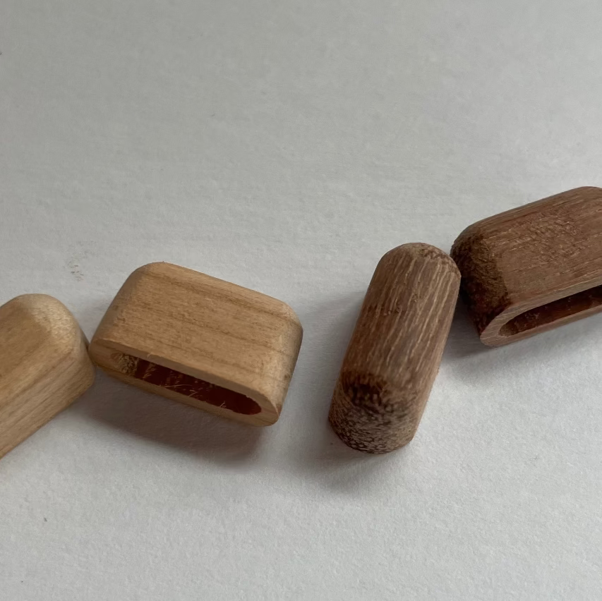 Wooden beads on a light gray background