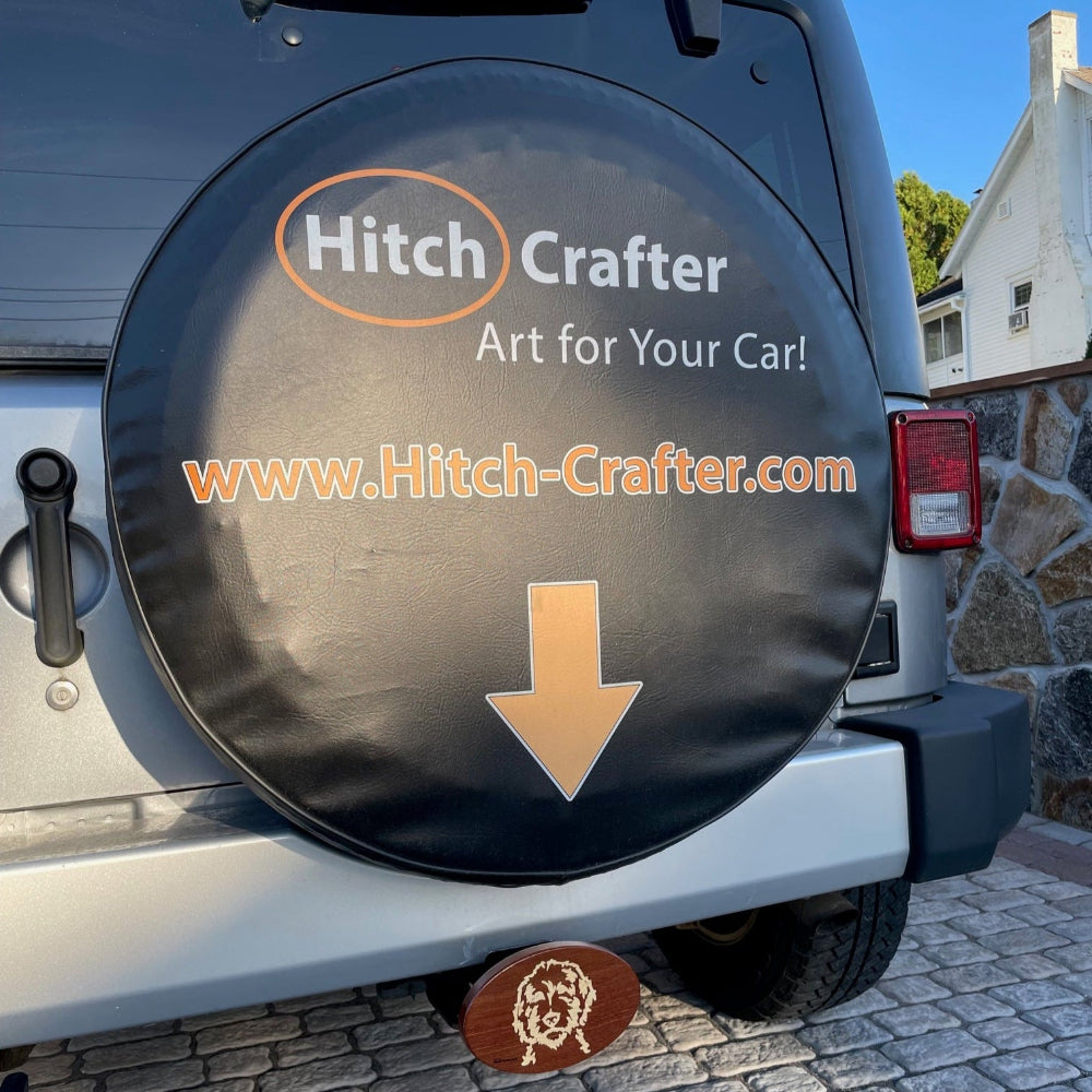 Hitch Crafter - Art for Your Car - logo and arrow pointing to wooden inlay hitch cover in hitch area.